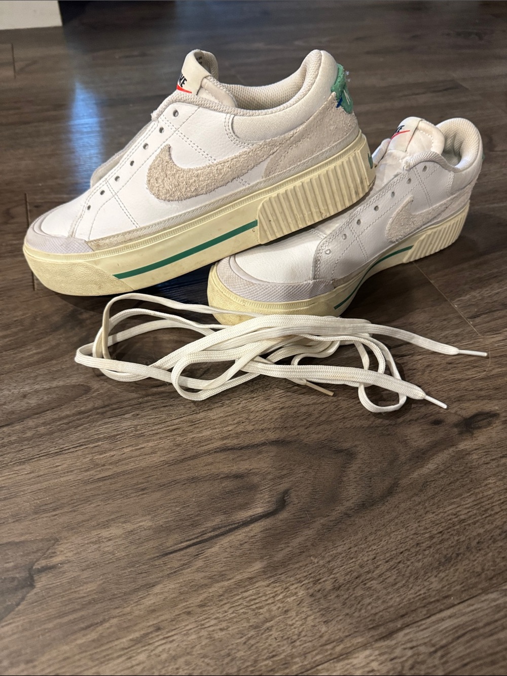 Nike Kids White Sneakers with Green Accent